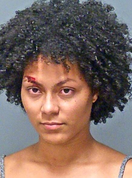 Woman crashes in Manchester with 3 kids in car