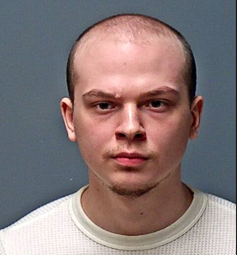 One arrested; police searching for another in apartment building shooting