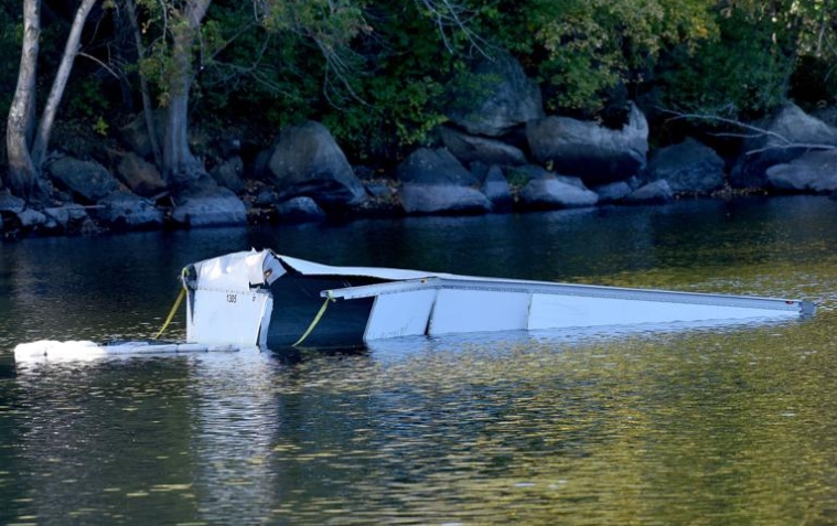 Accident leaves multiple injured and sends box truck into Merrimack River